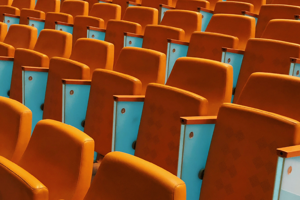 rows of bright orange seats