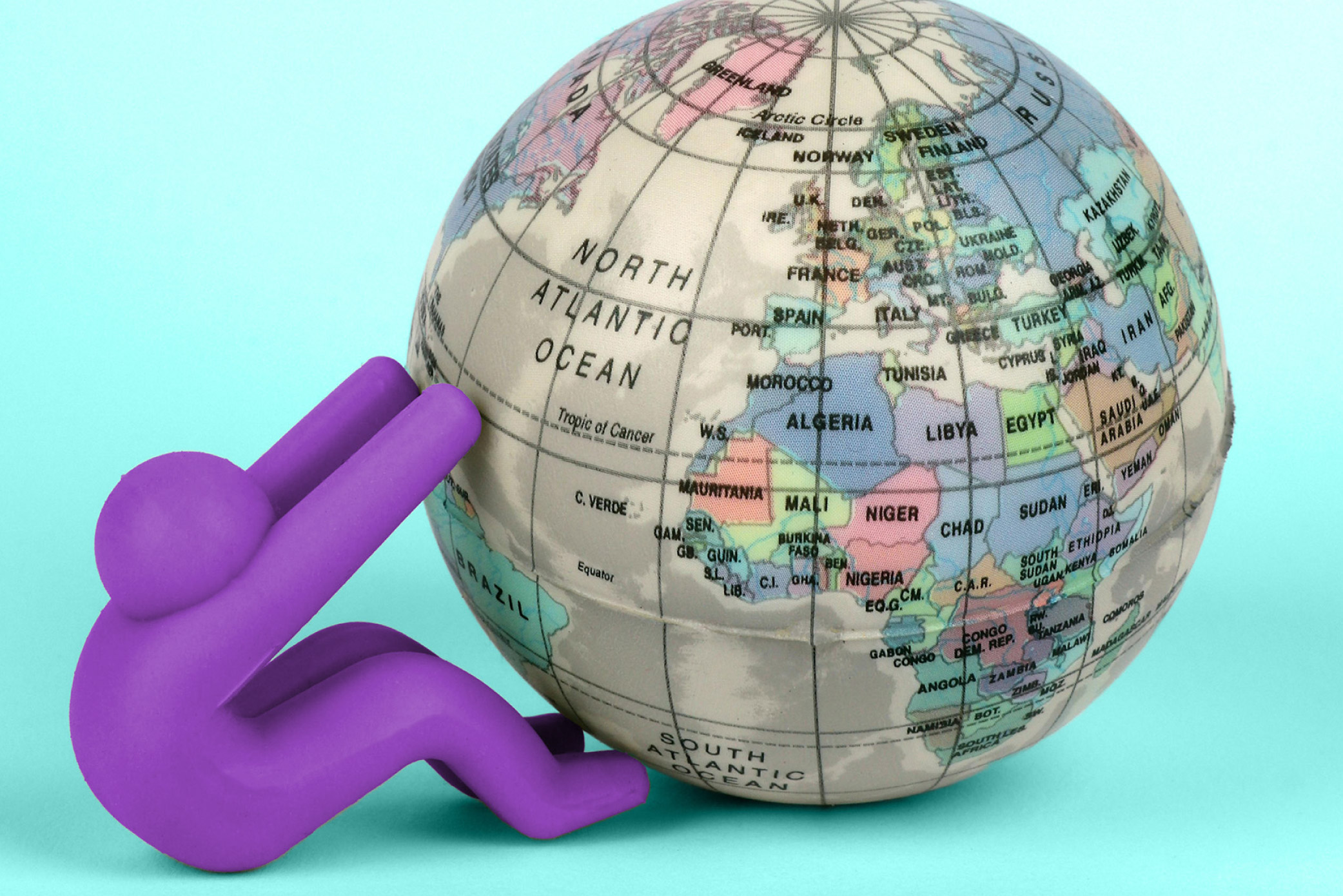 A blue background with a purple human figure bracing themselves against a globe to hold it steady.