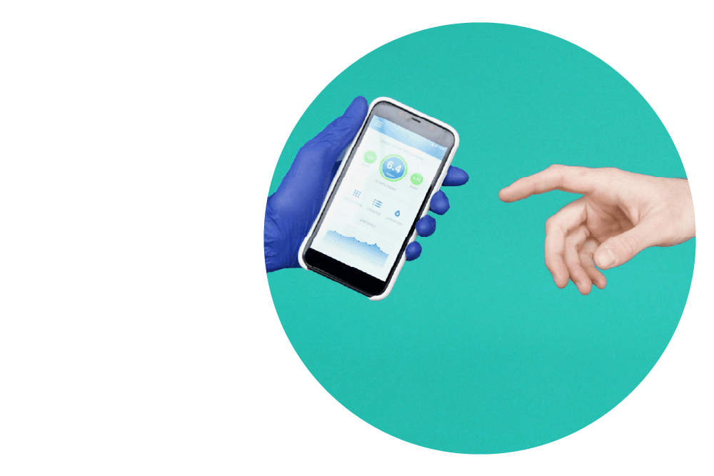 two hands against a turquoise background. The first hand is holding a mobile phone and wearing a blue latex glove. The second is reaching towards the first with the index finger pointing forward.